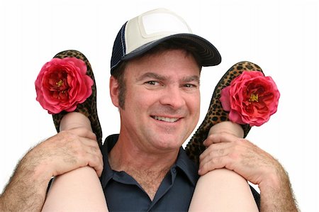 A repairman smiling as he services a housewife.  Her feet are on his shoulders.  Isolated. Stock Photo - Budget Royalty-Free & Subscription, Code: 400-04485260