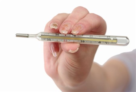 Thermometer in a female hand on a white background Stockbilder - Microstock & Abonnement, Bildnummer: 400-04485874