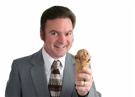 excited ice cream - A businessman holding an ice cream cone and smiling a big grin. Isolated. Stock Photo - Budget Royalty-Free & Subscription, Code: 400-04486173