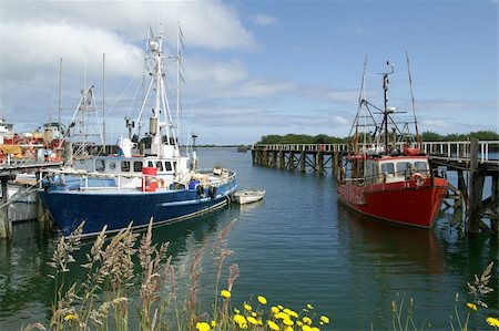 Fishing boats in Westport, South Island New Zealand Stock Photo - Budget Royalty-Free & Subscription, Code: 400-04486248