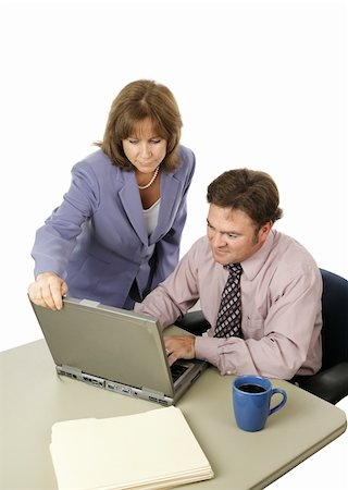 A male-female business team working intensely trying to meet a deadline.  Isolated on white. Stock Photo - Budget Royalty-Free & Subscription, Code: 400-04486266