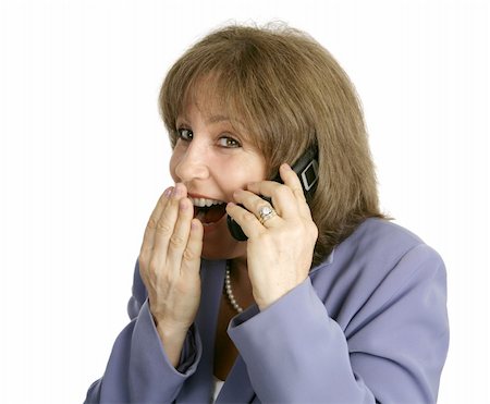 simsearch:400-03972372,k - An attractive businesswoman hearing juicy gossip on her cellphone.  Isolated. Stock Photo - Budget Royalty-Free & Subscription, Code: 400-04486268