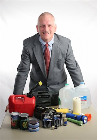 drinking can - A meteorologist displaying hurricane supplies Stock Photo - Budget Royalty-Free & Subscription, Code: 400-04486290