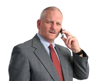 simsearch:400-03972352,k - a businessman receiving serious news on the cell phone. Stock Photo - Budget Royalty-Free & Subscription, Code: 400-04486315