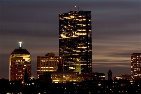 Buildings begin to light up as darkness approaches Stock Photo - Budget Royalty-Free & Subscription, Code: 400-04486576