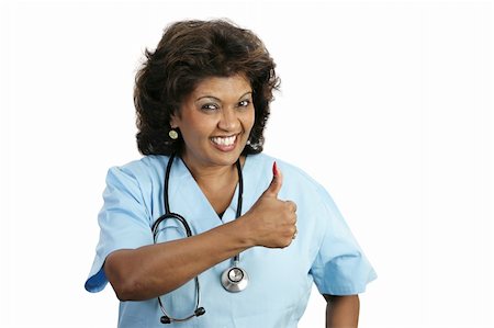 A doctor or nurse giving their patient the thumbs-up sign.  Everything is going to be okay!  Isolated on white. Stock Photo - Budget Royalty-Free & Subscription, Code: 400-04486678