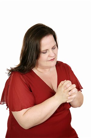 dress for fat women - Beautiful plus sized model praying.  Isolated on white. Stock Photo - Budget Royalty-Free & Subscription, Code: 400-04486694