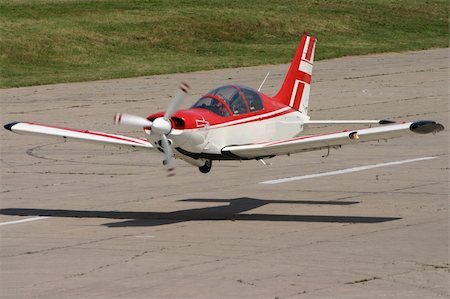 Small plane taking off Stock Photo - Budget Royalty-Free & Subscription, Code: 400-04486727