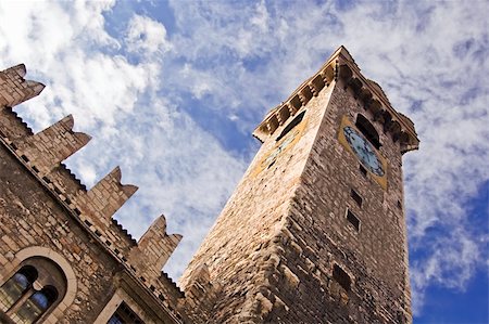 siege - Medieval tower with clock of a caste in Trento (Italy) Stock Photo - Budget Royalty-Free & Subscription, Code: 400-04486926