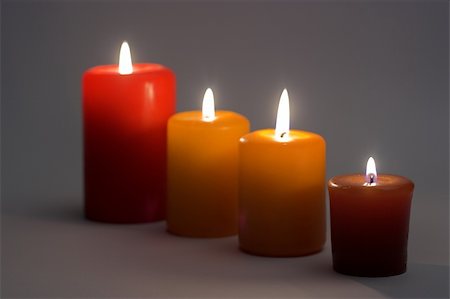simsearch:400-06101480,k - Some flaming candles close up Stock Photo - Budget Royalty-Free & Subscription, Code: 400-04486986