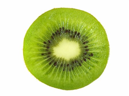 simsearch:400-05303673,k - A sliced kiwi fruit, isolated on white Photographie de stock - Aubaine LD & Abonnement, Code: 400-04487301