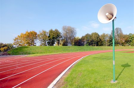 simsearch:400-03942081,k - racetrack for runners and a speaker in the grass Foto de stock - Royalty-Free Super Valor e Assinatura, Número: 400-04487814