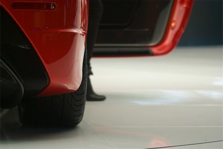 Supercar rearview. Focus on the back of the red car. Stockbilder - Microstock & Abonnement, Bildnummer: 400-04487917