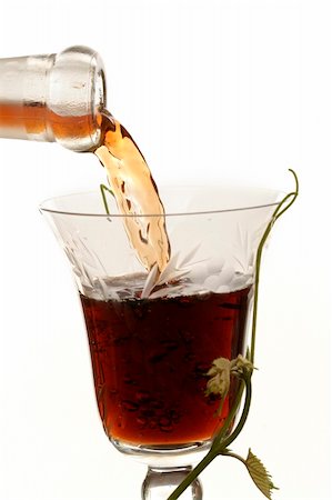 simsearch:400-06796159,k - Red wine pouring down from a wine bottle Stock Photo - Budget Royalty-Free & Subscription, Code: 400-04487978