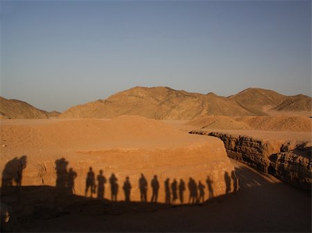 egypt and canyon - Shadows of tourists on a wall in desert Stock Photo - Budget Royalty-Free & Subscription, Code: 400-04488629