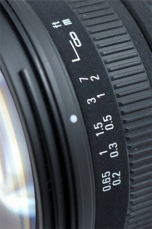 simsearch:400-04909492,k - Close up of distance scale of camera lens Stock Photo - Budget Royalty-Free & Subscription, Code: 400-04489166