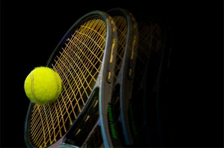 simsearch:400-04067347,k - Tennis racket and ball on black background Foto de stock - Super Valor sin royalties y Suscripción, Código: 400-04489515