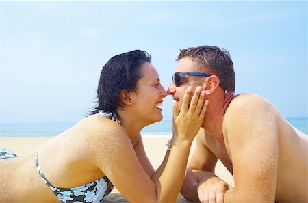 simsearch:400-05227851,k - a portrait of attractive couple having fun on the beach Fotografie stock - Microstock e Abbonamento, Codice: 400-04489815