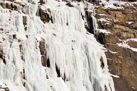 simsearch:400-04259396,k - Ice climbers at the Weeping Wall in Banff National Park Fotografie stock - Microstock e Abbonamento, Codice: 400-04489843