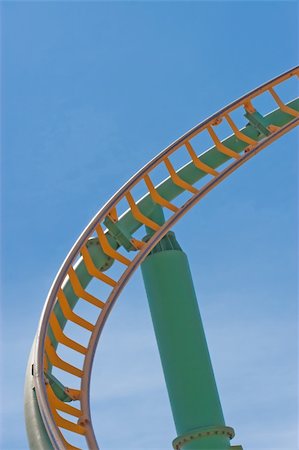 simsearch:400-05222693,k - Rollercoaster track against a brilliant blue sky Photographie de stock - Aubaine LD & Abonnement, Code: 400-04480298