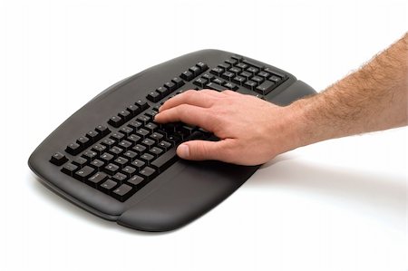 Hand typing on black keyboard on white background Stock Photo - Budget Royalty-Free & Subscription, Code: 400-04480346