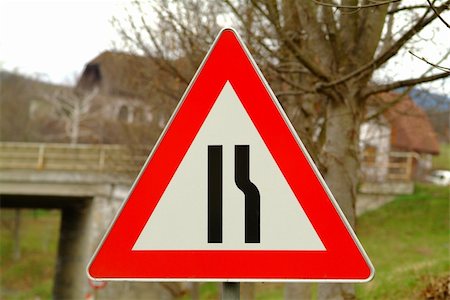 simsearch:400-04480527,k - a traffic sign for the road constriction with background Stock Photo - Budget Royalty-Free & Subscription, Code: 400-04480530