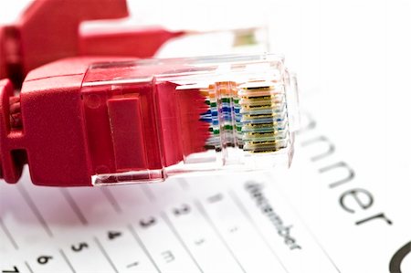 Business planner with red RJ45 networking cables Stock Photo - Budget Royalty-Free & Subscription, Code: 400-04480906