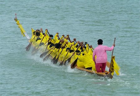 escaler - Paddlers in a longboat during a race in Thailand Foto de stock - Royalty-Free Super Valor e Assinatura, Número: 400-04481437