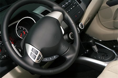 simsearch:400-07323023,k - Sterring wheel in interior of the new car Stock Photo - Budget Royalty-Free & Subscription, Code: 400-04481539
