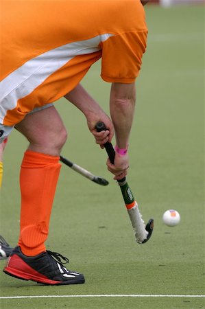 field hockey - close-up of outdoor hockey player in action Stock Photo - Budget Royalty-Free & Subscription, Code: 400-04481540
