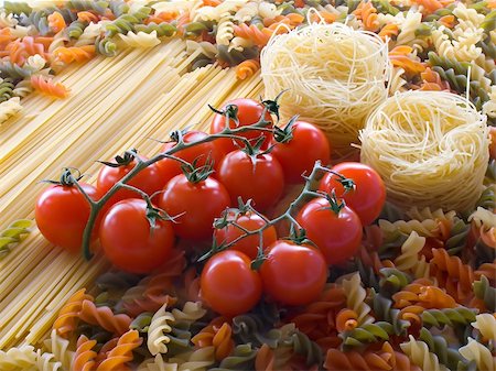 Tomato on different pasta and spaghetti background Foto de stock - Super Valor sin royalties y Suscripción, Código: 400-04481677