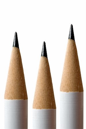 simsearch:400-08295099,k - Closeup on three white pencils over white background - very high detail Fotografie stock - Microstock e Abbonamento, Codice: 400-04481770