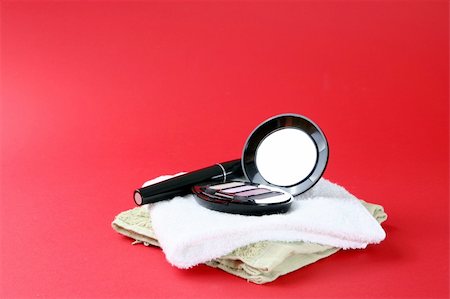 simsearch:400-04856775,k - Cosmetics isolated on red background Stock Photo - Budget Royalty-Free & Subscription, Code: 400-04482464