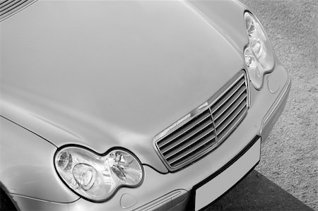 Luxury car headlights and front grille Stock Photo - Budget Royalty-Free & Subscription, Code: 400-04482505
