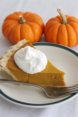 simsearch:400-04145790,k - A slice of pumpkin pie with whipped cream and a fork - vertical orientation. Stock Photo - Budget Royalty-Free & Subscription, Code: 400-04482882