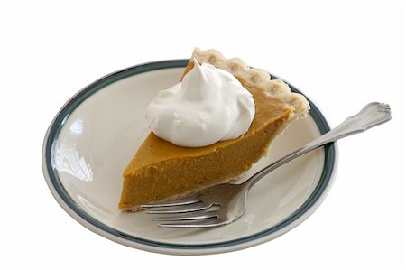 simsearch:400-04145790,k - A slice of pumpkin pie on a plate with whipped cream and a fork, isolated. Stock Photo - Budget Royalty-Free & Subscription, Code: 400-04482883
