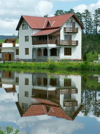 House at lakeside Stock Photo - Budget Royalty-Free & Subscription, Code: 400-04483297