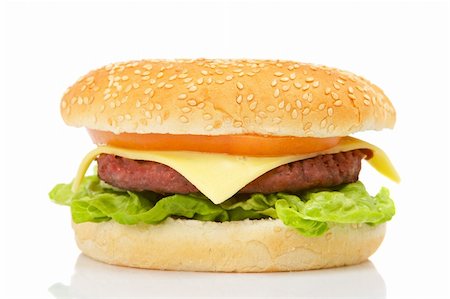 simsearch:628-02954492,k - Cheeseburger with lettuce and tomato, reflected on white background Photographie de stock - Aubaine LD & Abonnement, Code: 400-04483442