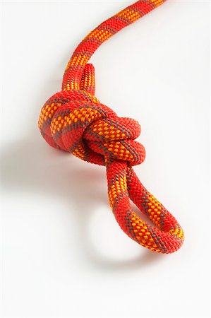 simsearch:400-05136963,k - Knot from a multi-coloured cord on a white background Stock Photo - Budget Royalty-Free & Subscription, Code: 400-04483637