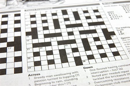 simsearch:600-02659564,k - Close up of a crossword puzzle Fotografie stock - Microstock e Abbonamento, Codice: 400-04483706