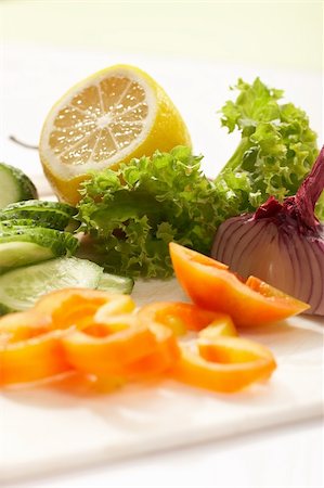 vegetable mix: lettuce, onion, lemon, cucumber Stock Photo - Budget Royalty-Free & Subscription, Code: 400-04494247
