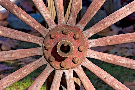 simsearch:400-05102252,k - Closeup of an old, antique wagon wheel Stock Photo - Budget Royalty-Free & Subscription, Code: 400-04494390