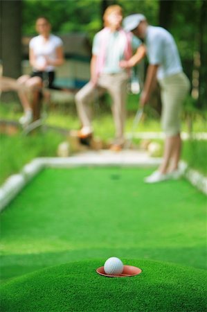 simsearch:400-05370464,k - Ball for a golf flying to a hole Stock Photo - Budget Royalty-Free & Subscription, Code: 400-04494716