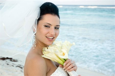 Bride on beach with her bouquet Stock Photo - Budget Royalty-Free & Subscription, Code: 400-04494898