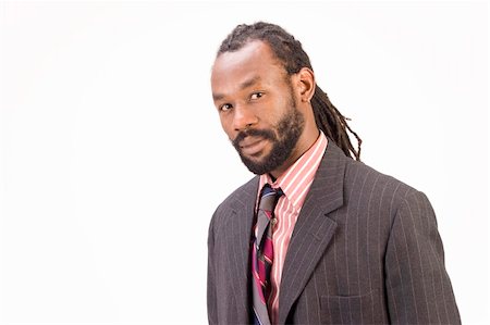 rasta man - A black man with dreadlock hair isolated on a white background. Stock Photo - Budget Royalty-Free & Subscription, Code: 400-04495749