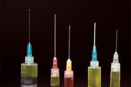 simsearch:400-04501269,k - A set of sharp medical pharmaceutical syringes. Stock Photo - Budget Royalty-Free & Subscription, Code: 400-04496114
