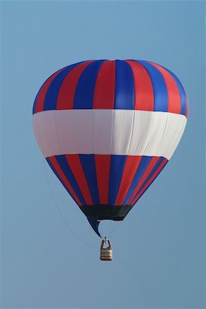 Red, white and blue, un-manned hot-air balloon flying. Stock Photo - Budget Royalty-Free & Subscription, Code: 400-04496178