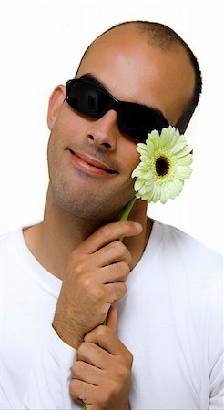 simsearch:400-04520503,k - Man with a beautiful yellow flower Stock Photo - Budget Royalty-Free & Subscription, Code: 400-04496286