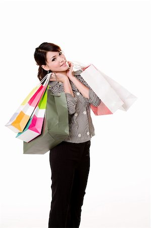 eyedear (artist) - young woman happily shopping full of paper bags Stock Photo - Budget Royalty-Free & Subscription, Code: 400-04496403