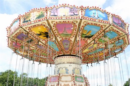 swing chair ride - vintage steam run roundabout at a steam rally Stock Photo - Budget Royalty-Free & Subscription, Code: 400-04496516